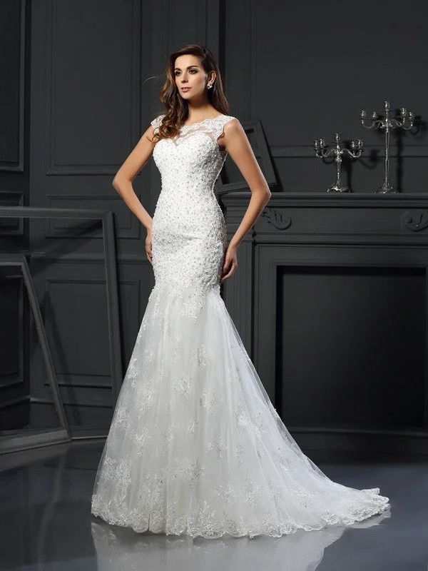 Trumpet/Mermaid Scoop Applique Short Sleeves Long Tulle Wedding Dresses TPP0006321